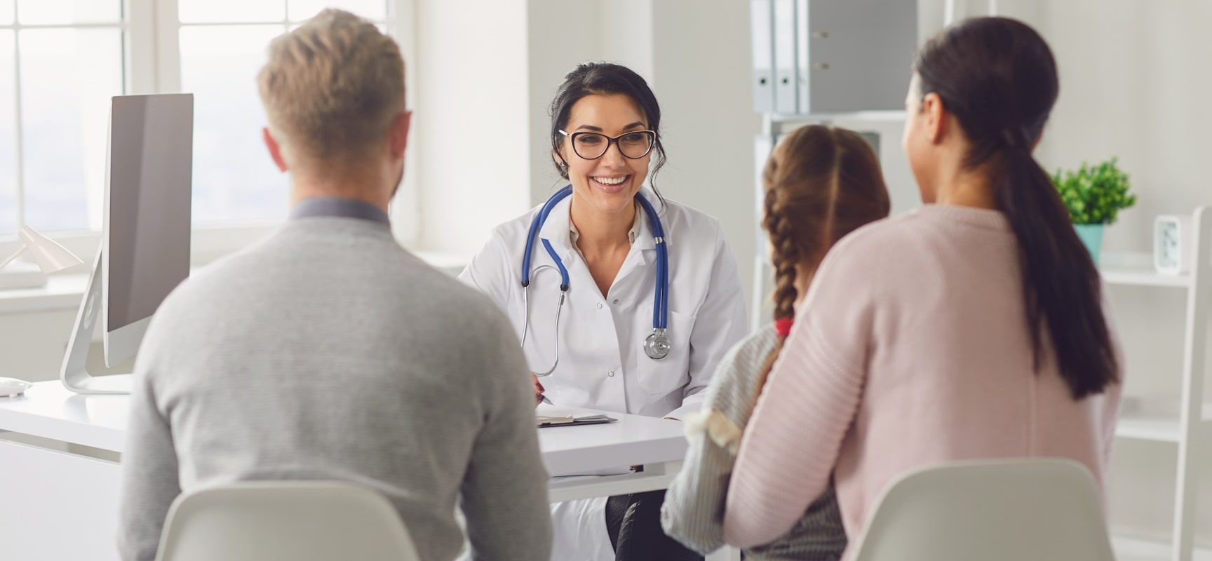 Family speaking with doctor