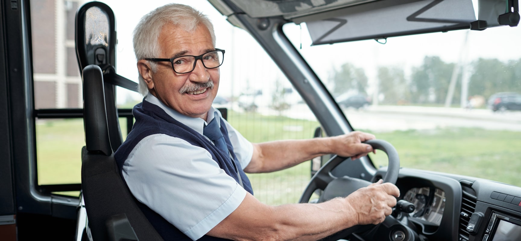 Smiling school bus driver